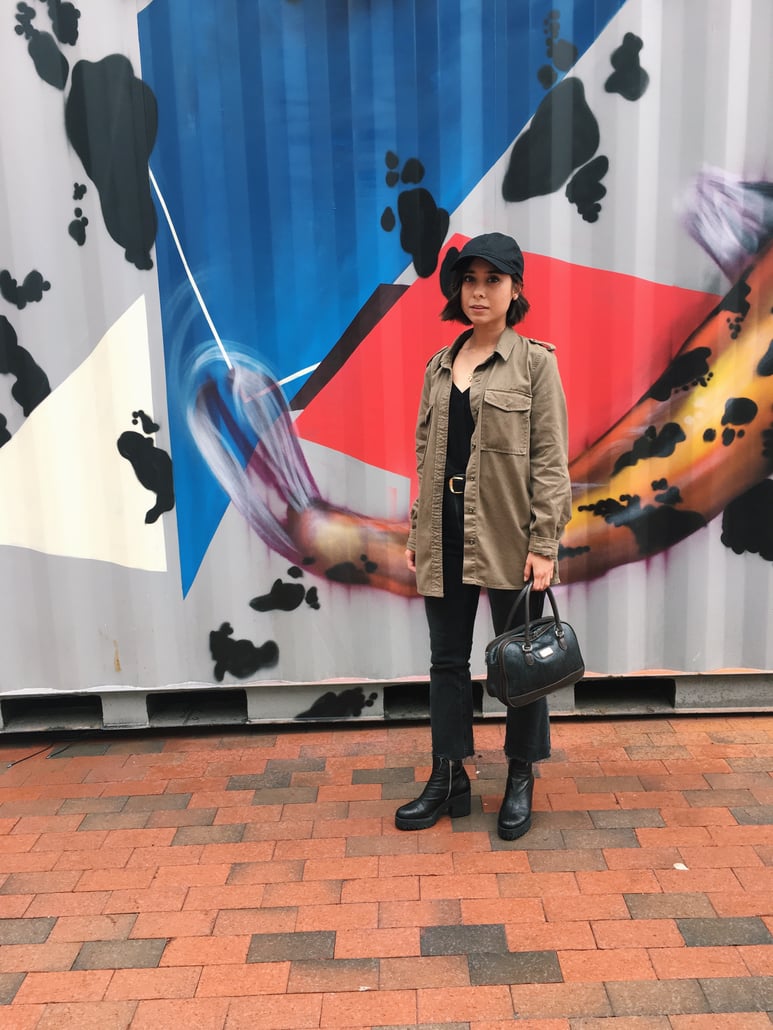 rainy day outfit, kick flare jeans, army jacket, baseball hat, platform boots