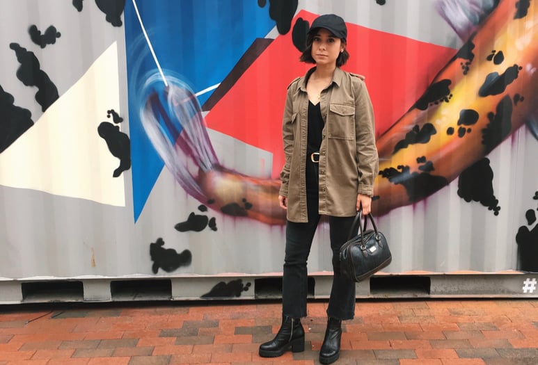 rainy day outfit, kick flare jeans, army jacket, baseball hat, platform boots