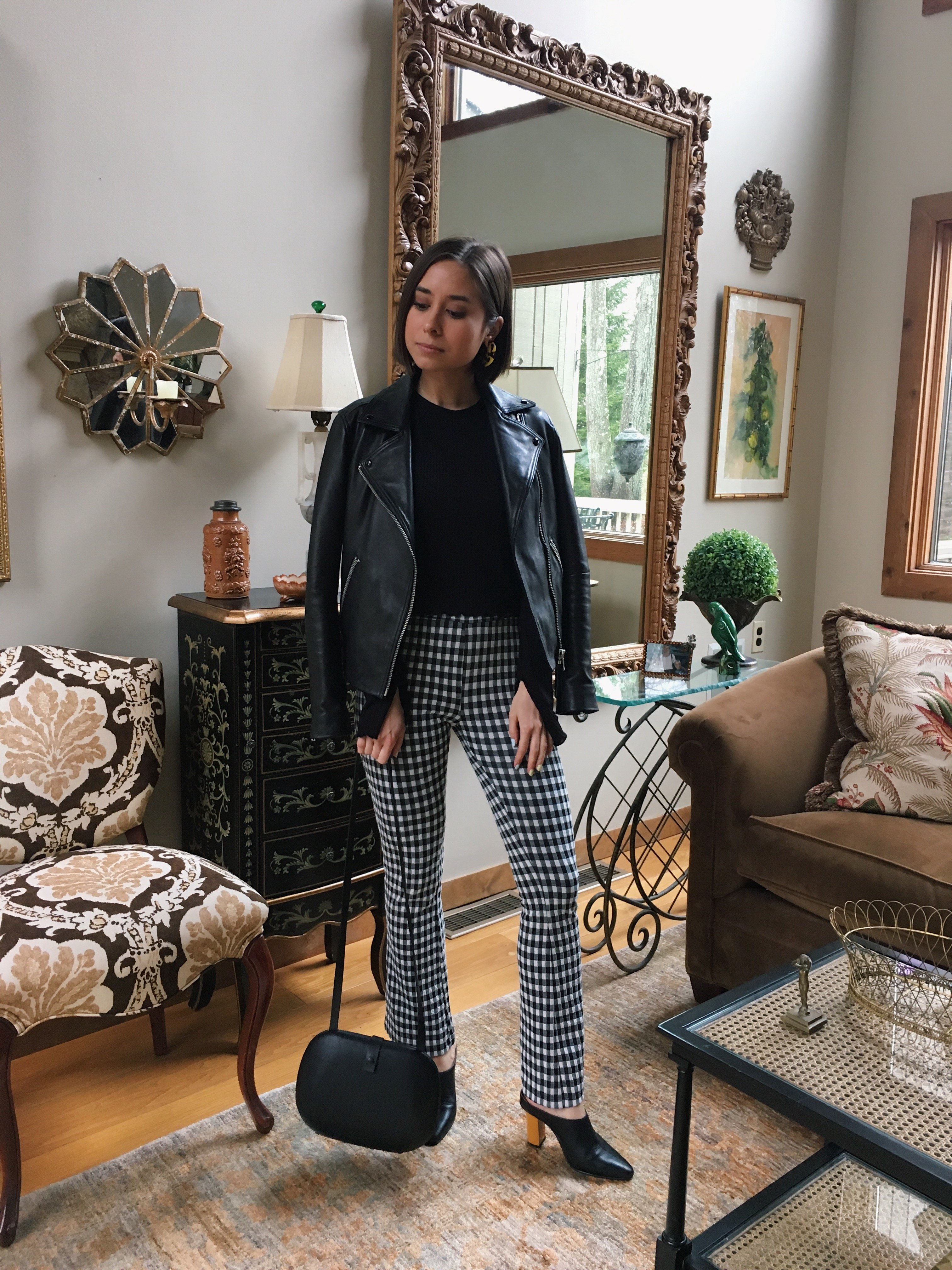 boston fashion blogger in gingham pants, leather jacket, heeled mules