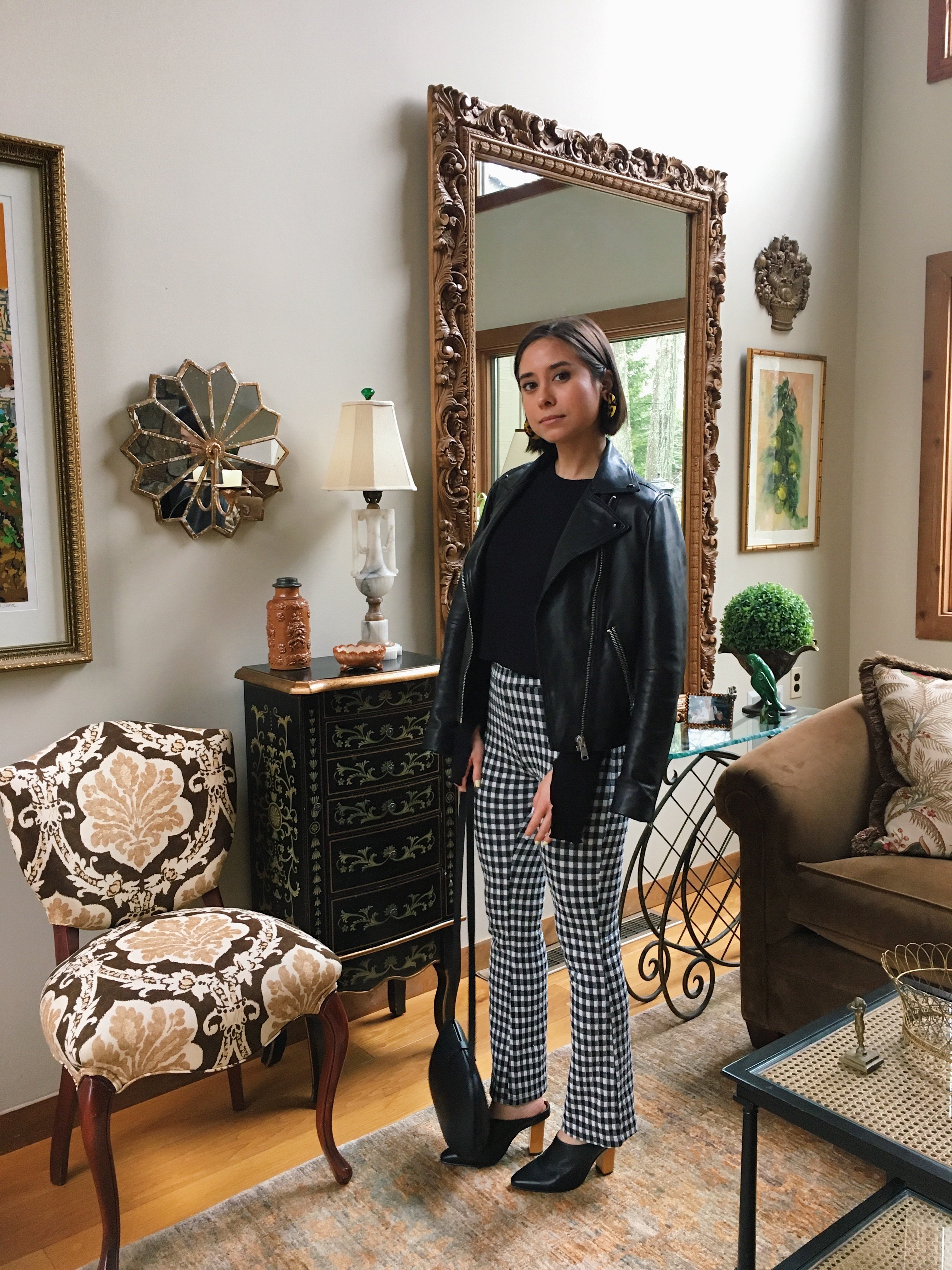 boston fashion blogger in gingham pants, leather jacket, heeled mules