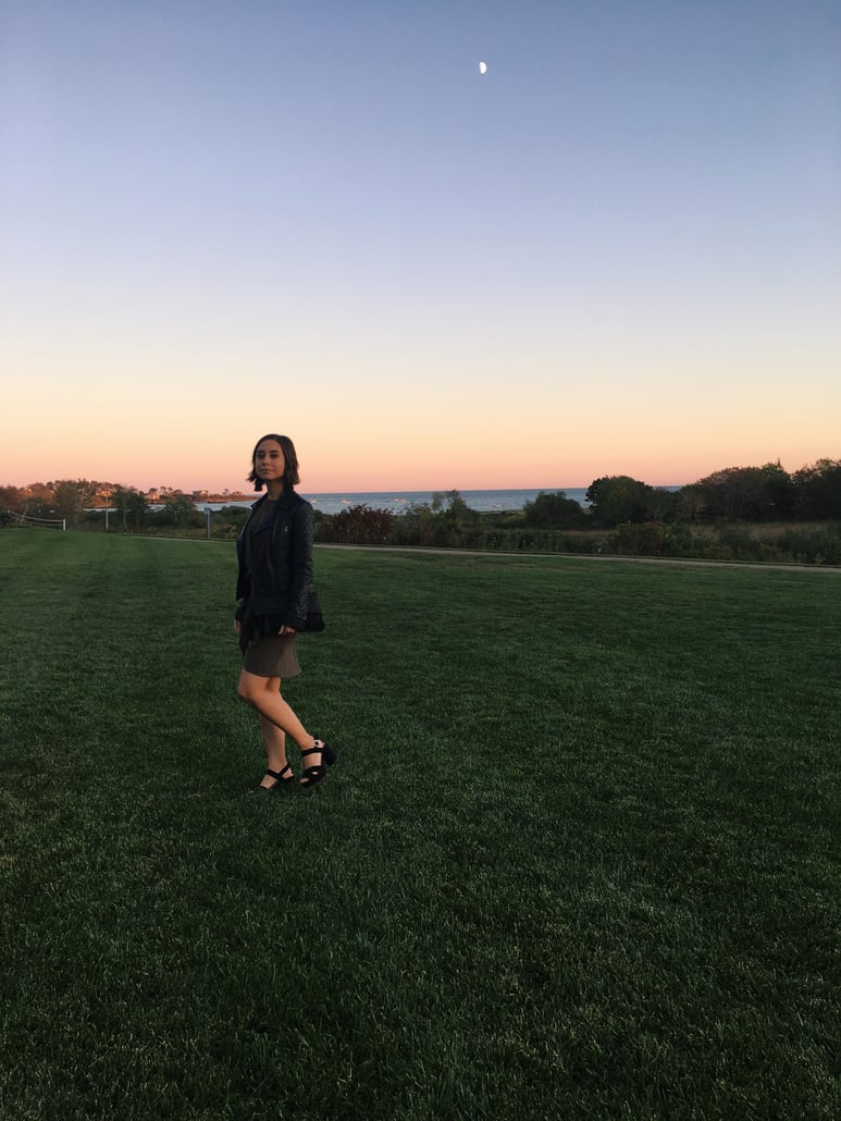 Wedding rehearsal dinner guest outfit in New England in autumn featuring Topshop dress, leather jacket, fringe earrings