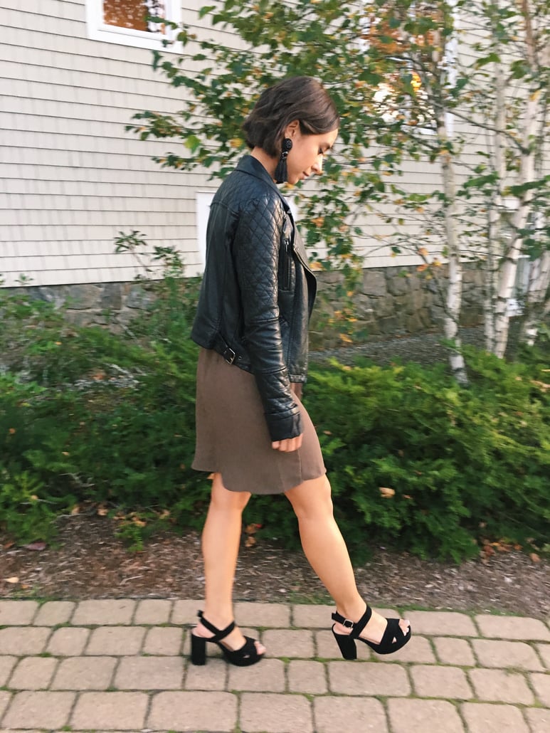 Wedding rehearsal dinner guest outfit in New England in autumn featuring Topshop dress, leather jacket, fringe earrings