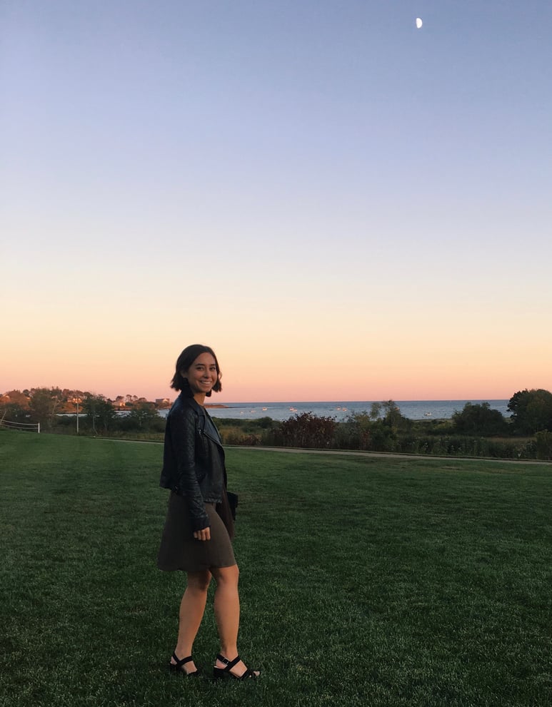 Wedding rehearsal dinner guest outfit in New England in autumn featuring Topshop dress, leather jacket, fringe earrings